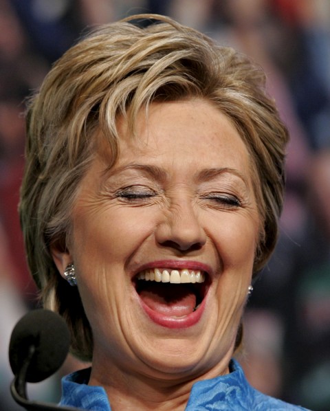 Democratic Presidential hopeful, Sen. Hillary Rodham Clinton, D-N.Y., laughs at a remark by moderator Chris Matthews, not shown, while addressing a forum sponsored by the American Federation of State, County and Municipal Employees, Tuesday, June 19, 2007, at the Marriott Wardman Park Hotel in Washington. AFSCME is the largest union for workers in the public service with 1.4 million members nationwide. (AP Photo/J. Scott Applewhite)